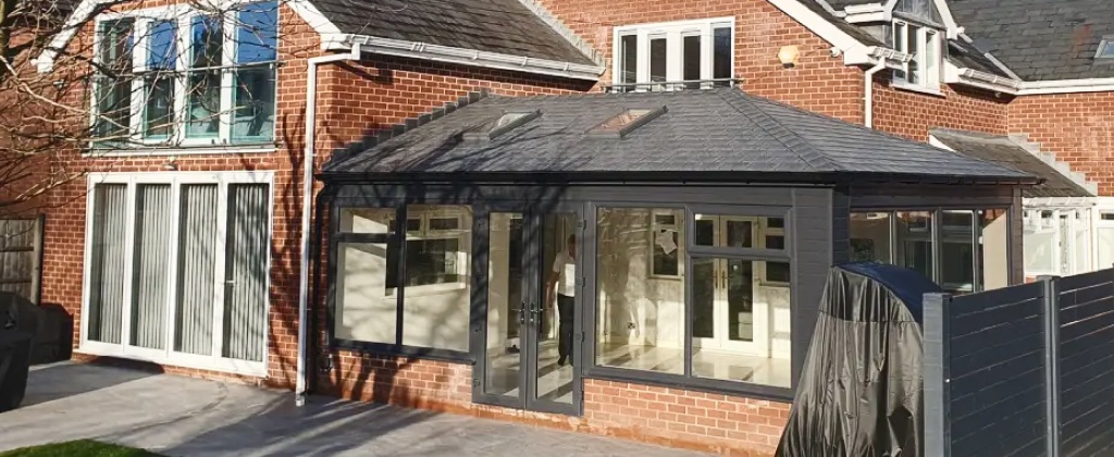 Modern conservatory with tiled roof after full roof replacement upgrade