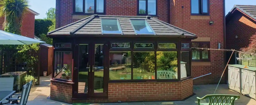 Conservatory with modern tiled roof improving insulation and energy efficiency